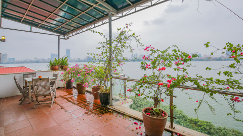 Lake view terrace apartment with one bedroom in Tay Ho for rent