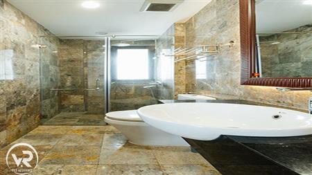 Guest bathroom has a glass shower
