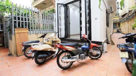 Modern house for rent in Tay Ho with yard, 04 bedrooms, partly furnished